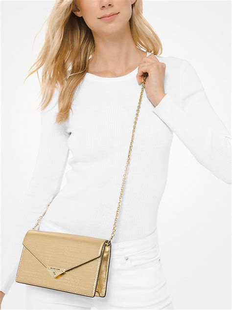 michael michael kors grace medium metallic leather envelope clutch|Grace Medium Metallic Leather Envelope Clutch .